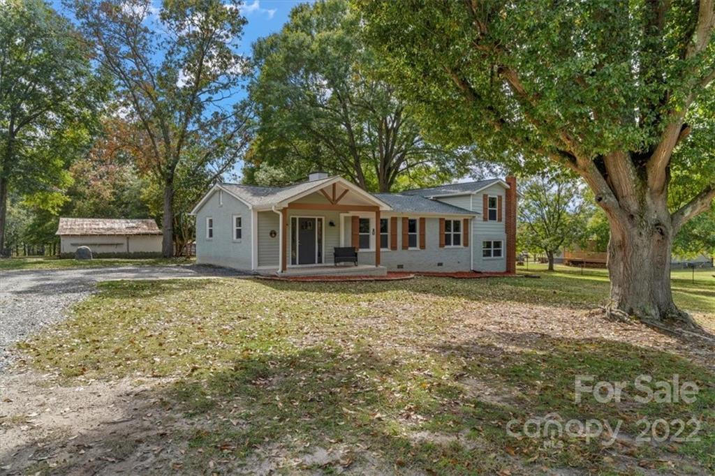 1631 Lawrence Road Clover, SC 29710 - Photo 2 of 48 a front view of a house with garden