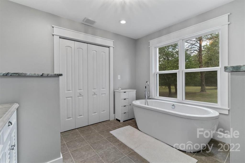 1631 Lawrence Road Clover, SC 29710 - Photo 26 of 48 a white tub sitting next to a window