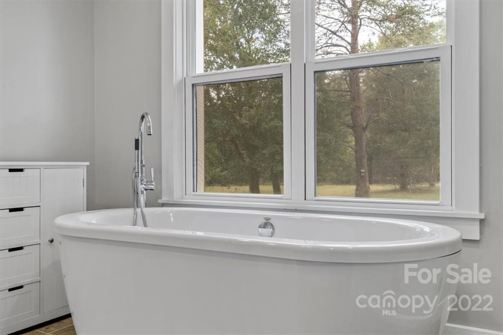 1631 Lawrence Road Clover, SC 29710 - Photo 28 of 48 a bathroom with a bathtub and a sink