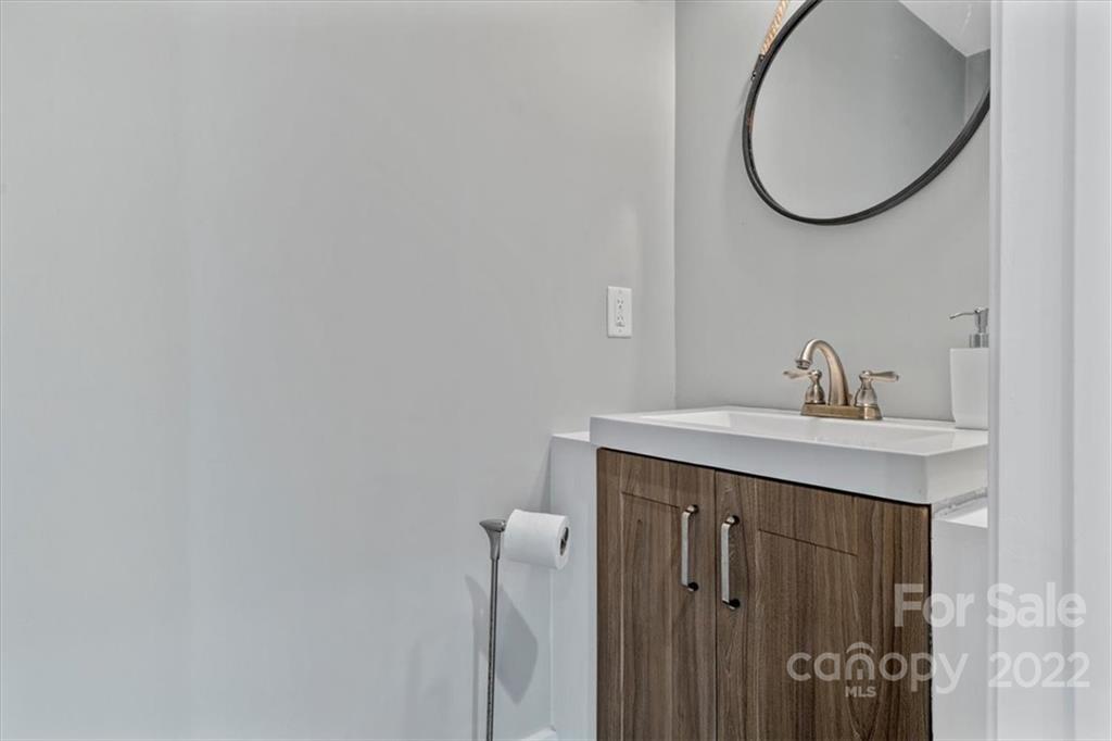 1631 Lawrence Road Clover, SC 29710 - Photo 29 of 48 a bathroom with a sink and mirror