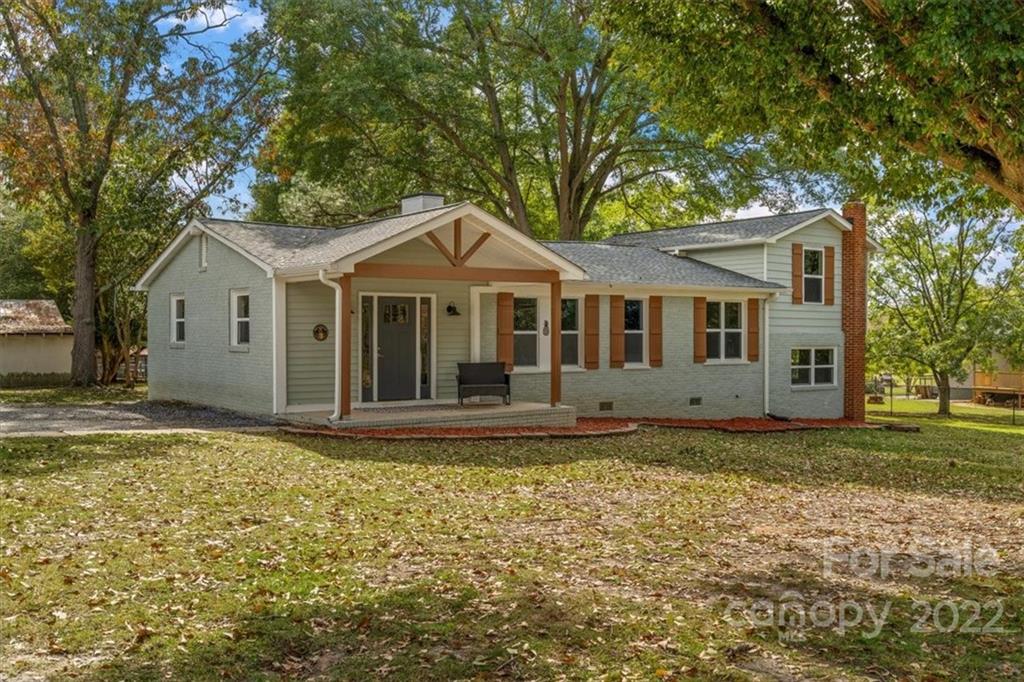 1631 Lawrence Road Clover, SC 29710 - Photo 3 of 48 a front view of a house with a garden
