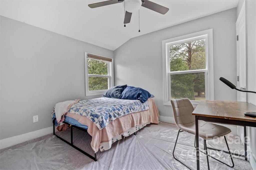 1631 Lawrence Road Clover, SC 29710 - Photo 35 of 48 a bed room with a bed and a window