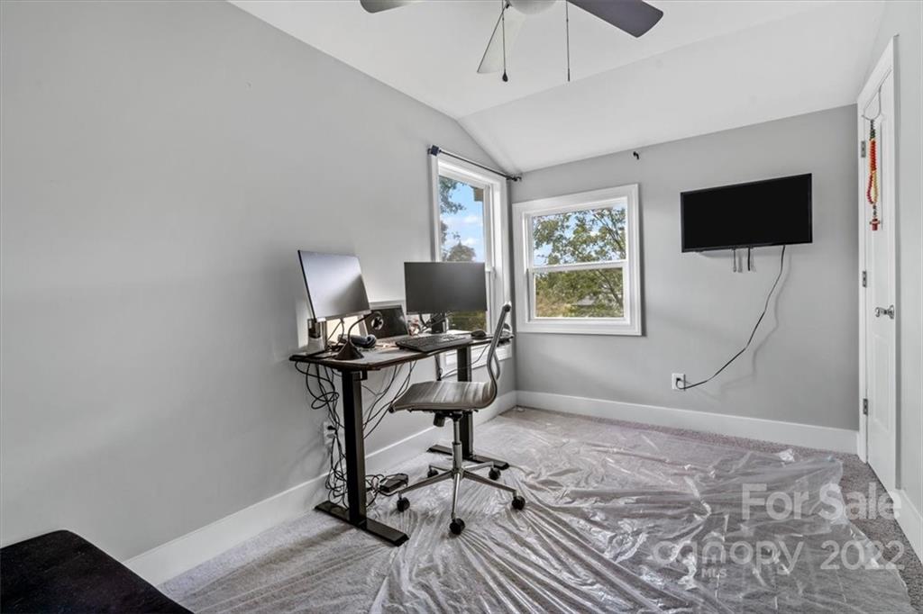 1631 Lawrence Road Clover, SC 29710 - Photo 37 of 48 a workspace with furniture and wooden floor