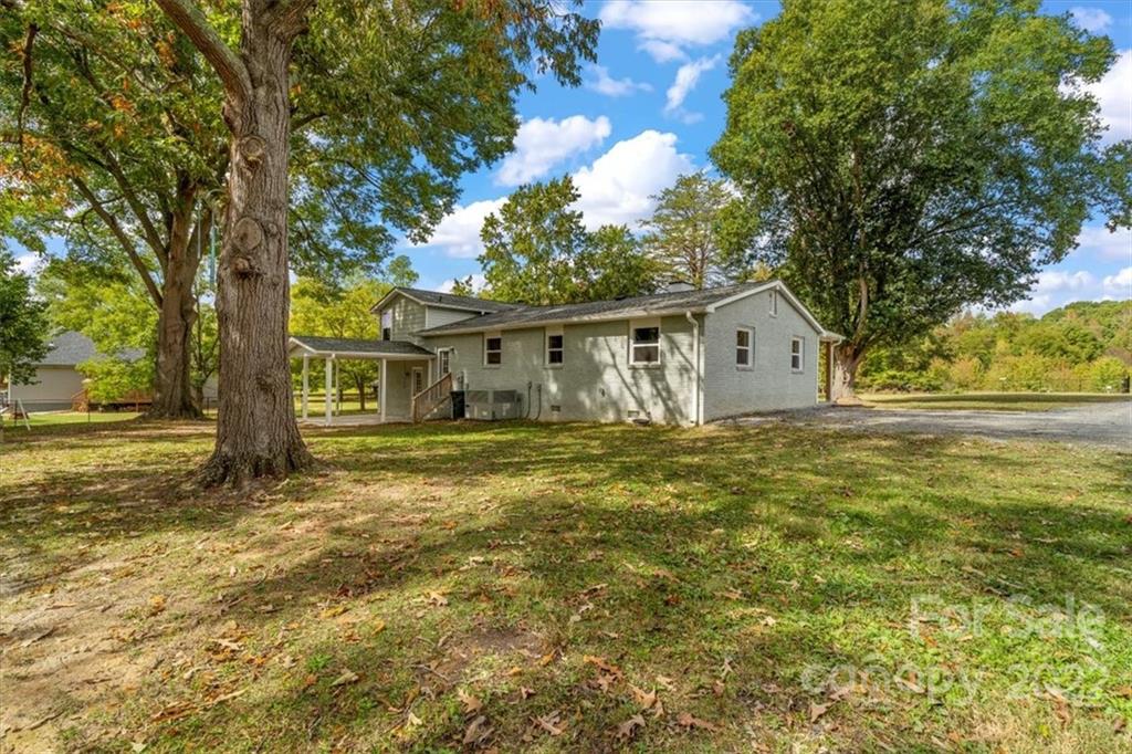 1631 Lawrence Road Clover, SC 29710 - Photo 39 of 48 a view of a house with a yard
