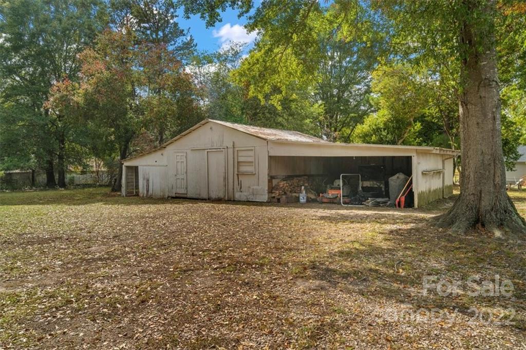1631 Lawrence Road Clover, SC 29710 - Photo 40 of 48 a view of a house with a yard and large tree