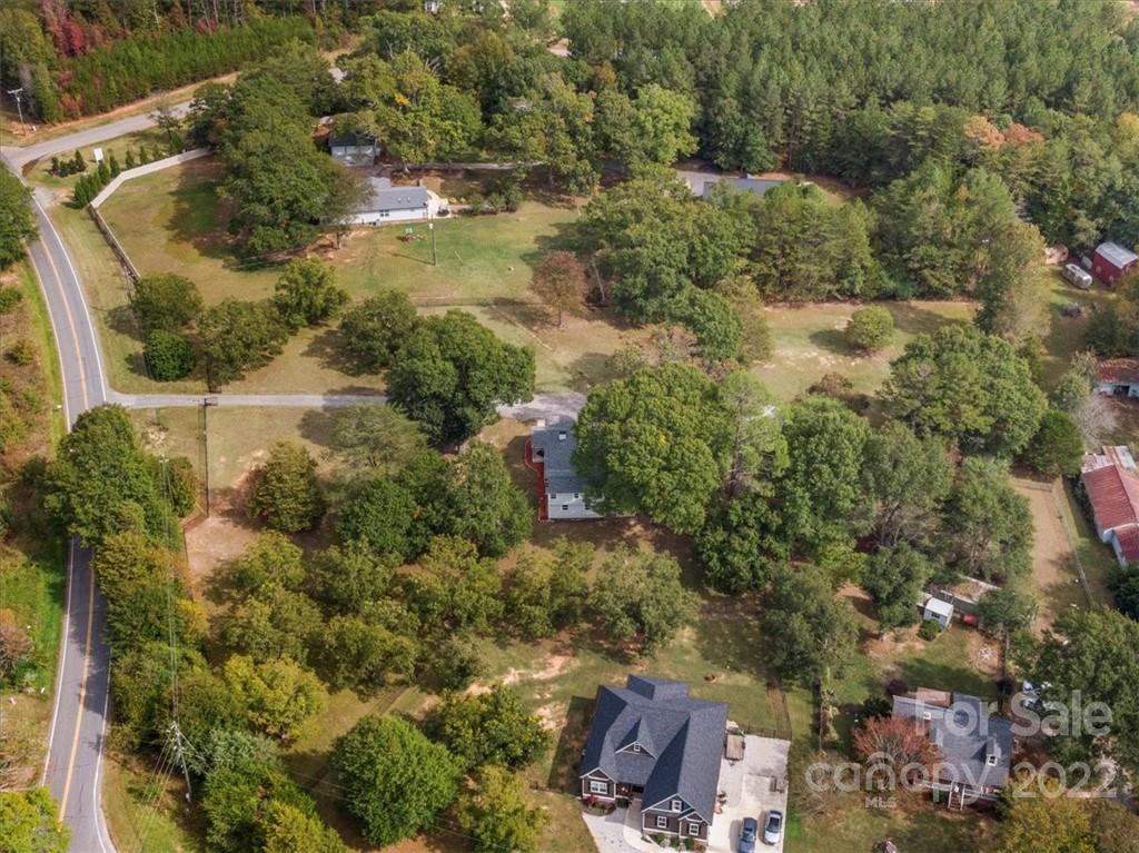 1631 Lawrence Road Clover, SC 29710 - Photo 45 of 48 an aerial view of residential houses with outdoor space and trees