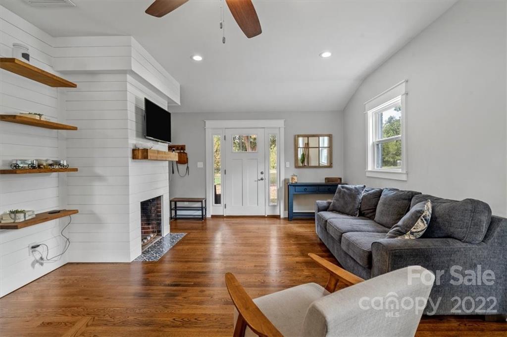 1631 Lawrence Road Clover, SC 29710 - Photo 8 of 48 a living room with furniture and a flat screen tv
