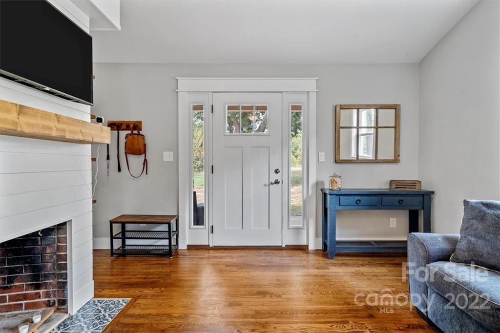 1631 Lawrence Road Clover, SC 29710 - Photo 9 of 48 a living room with furniture and a fireplace