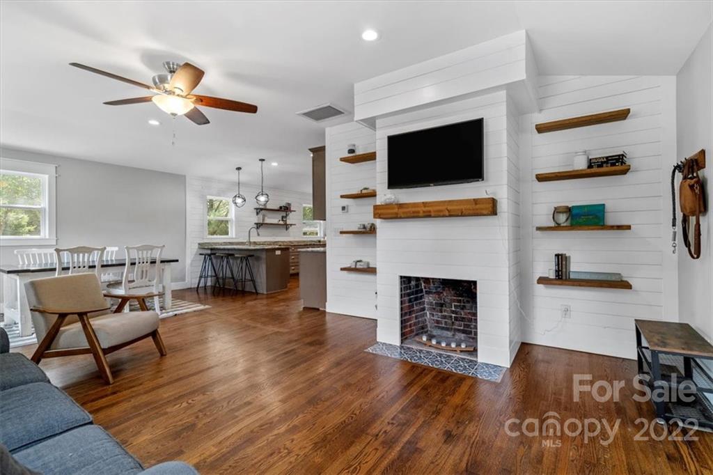 1631 Lawrence Road Clover, SC 29710 - Photo 10 of 48 a living room with furniture fireplace and flat screen tv