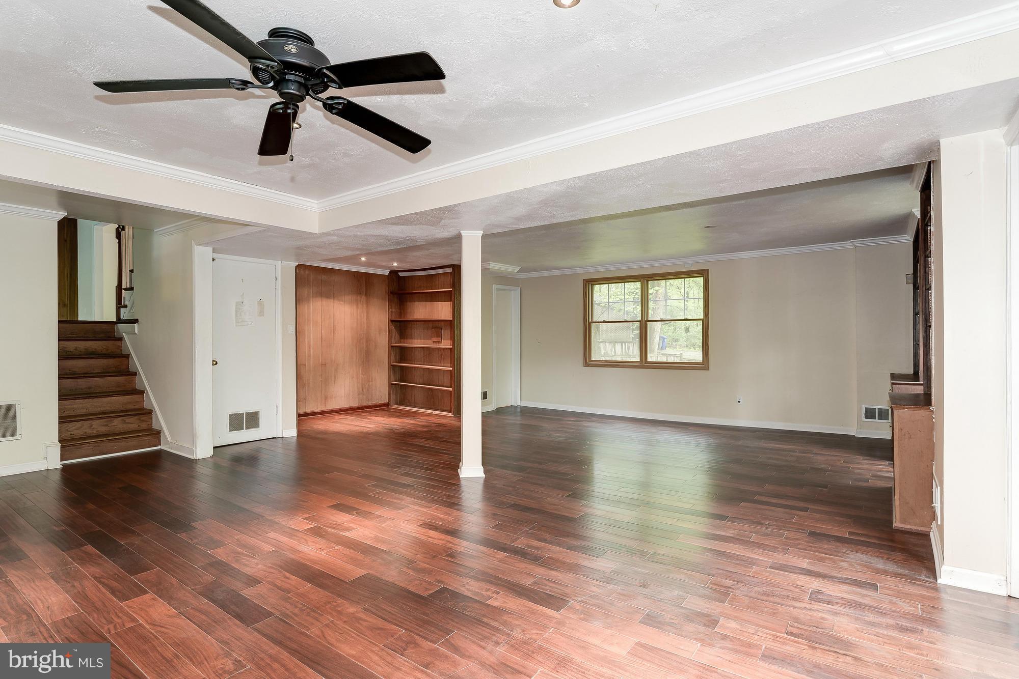 6308 Greentree Road Bethesda, MD 20817 - Photo 13 of 18 Family Room w/ Powder Rm