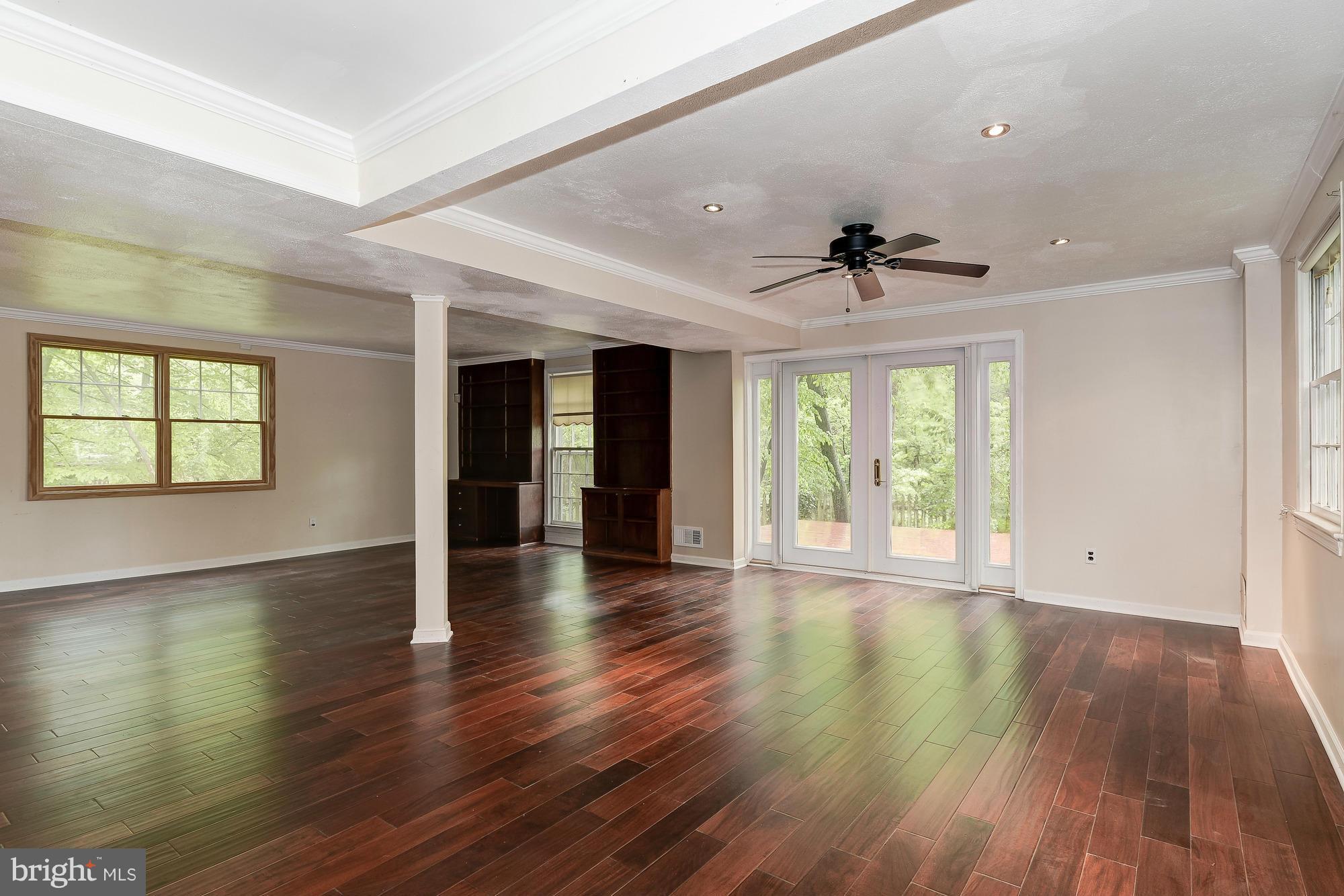 6308 Greentree Road Bethesda, MD 20817 - Photo 14 of 18 Family Room w/ Access to Side Deck