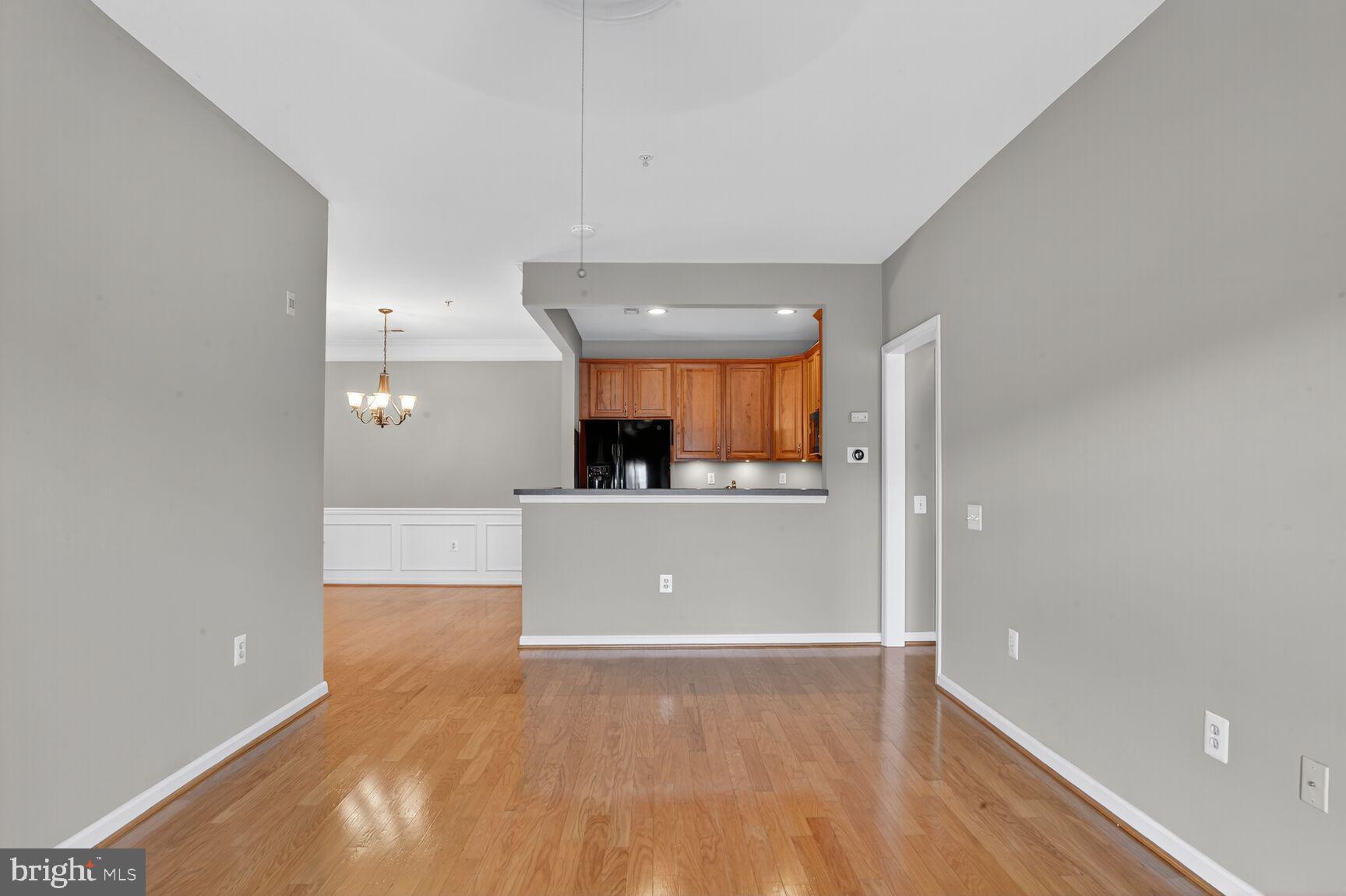402 Aggies Circle, Unit 402D Bel Air, MD 21014 - Photo 21 of 29 a view of a living room with kitchen