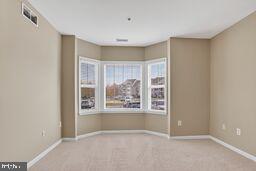 402 Aggies Circle, Unit 402D Bel Air, MD 21014 - Photo 22 of 29 a view of an empty room with a window