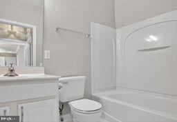 402 Aggies Circle, Unit 402D Bel Air, MD 21014 - Photo 26 of 29 a bathroom with a sink a toilet and shower