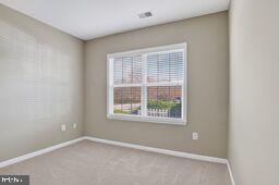 402 Aggies Circle, Unit 402D Bel Air, MD 21014 - Photo 27 of 29 a view of an empty room with a window