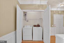 402 Aggies Circle, Unit 402D Bel Air, MD 21014 - Photo 3 of 29 a utility room with dryer and washer