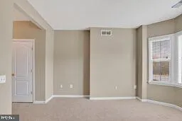 a view of an empty room with window