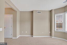 402 Aggies Circle, Unit 402D Bel Air, MD 21014 - Photo 5 of 29 a view of an empty room with window
