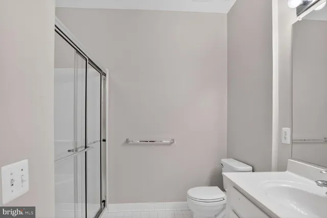 a kitchen with a refrigerator sink and stove