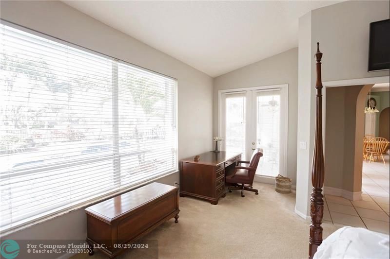 12253 Rockledge Circle Boca Raton, FL 33428 - Photo 14 of 22 a living room with furniture and a large window