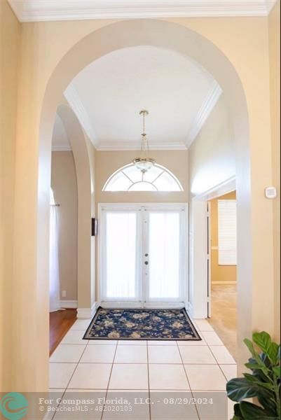 12253 Rockledge Circle Boca Raton, FL 33428 - Photo 2 of 22 a walk in closet with wooden floor