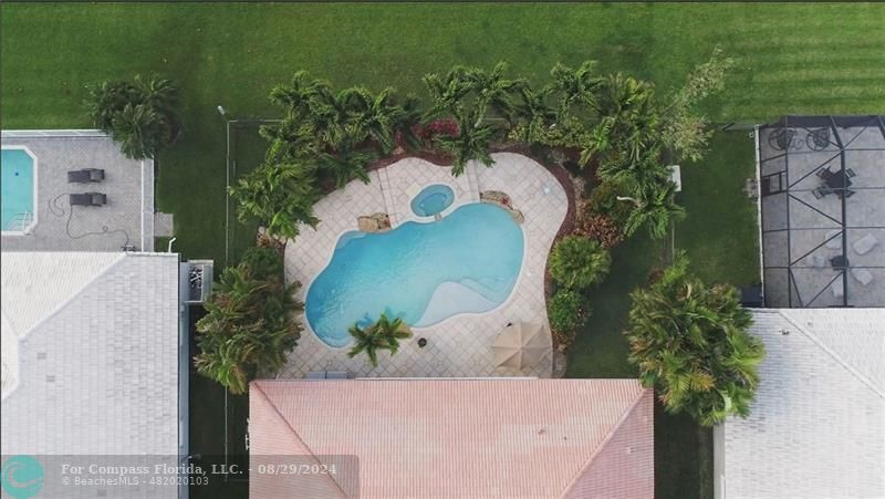 12253 Rockledge Circle Boca Raton, FL 33428 - Photo 22 of 22 an aerial view of a house with a yard and trees all around