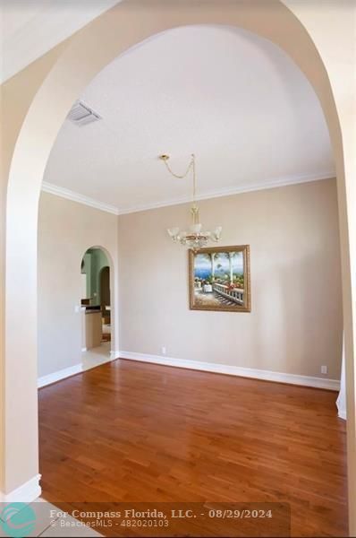 12253 Rockledge Circle Boca Raton, FL 33428 - Photo 4 of 22 a view of a room with wooden floor