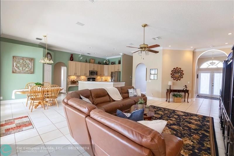 12253 Rockledge Circle Boca Raton, FL 33428 - Photo 7 of 22 a living room with furniture and wooden floor