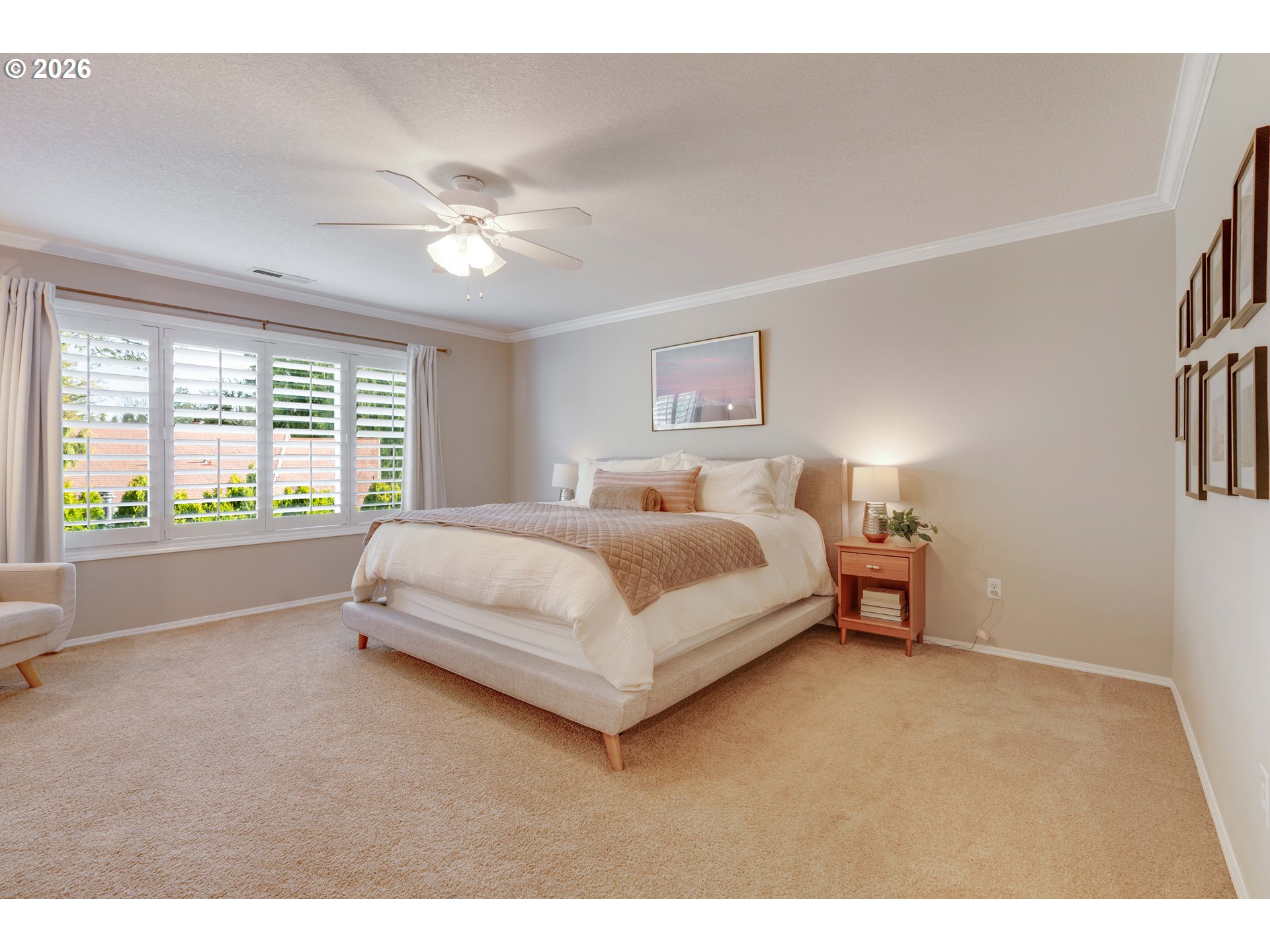 4485 Southwest Joshua Street Tualatin, OR 97062 - Photo 22 of 43 a bedroom with a bed and a large window