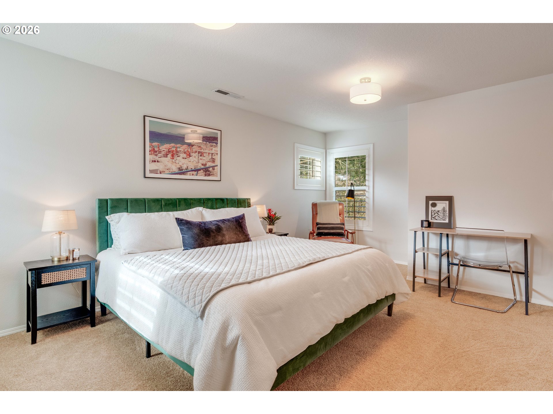 4485 Southwest Joshua Street Tualatin, OR 97062 - Photo 32 of 43 a bedroom with a bed and a table