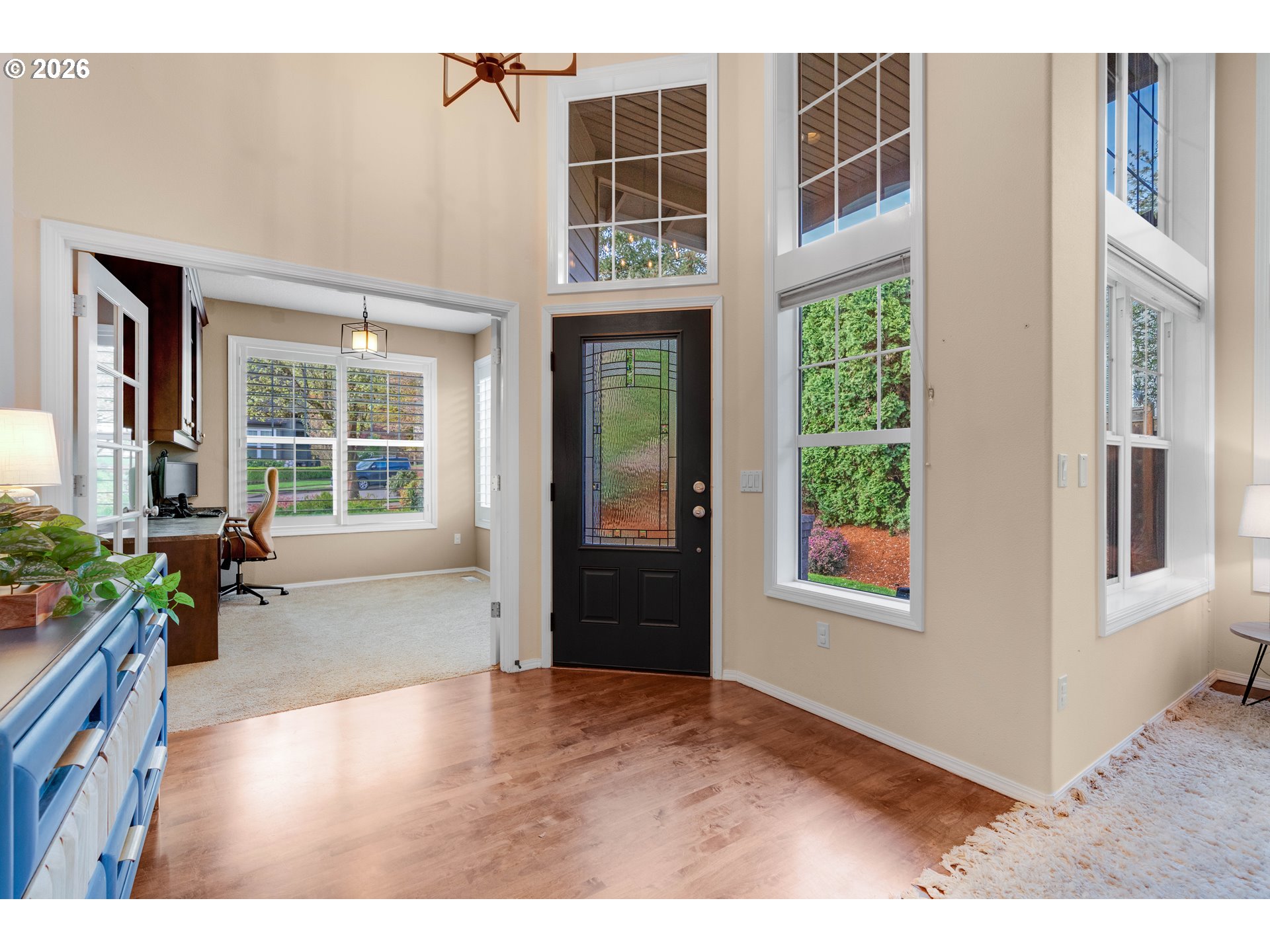 4485 Southwest Joshua Street Tualatin, OR 97062 - Photo 4 of 43 a view of an entryway with wooden floor and garden