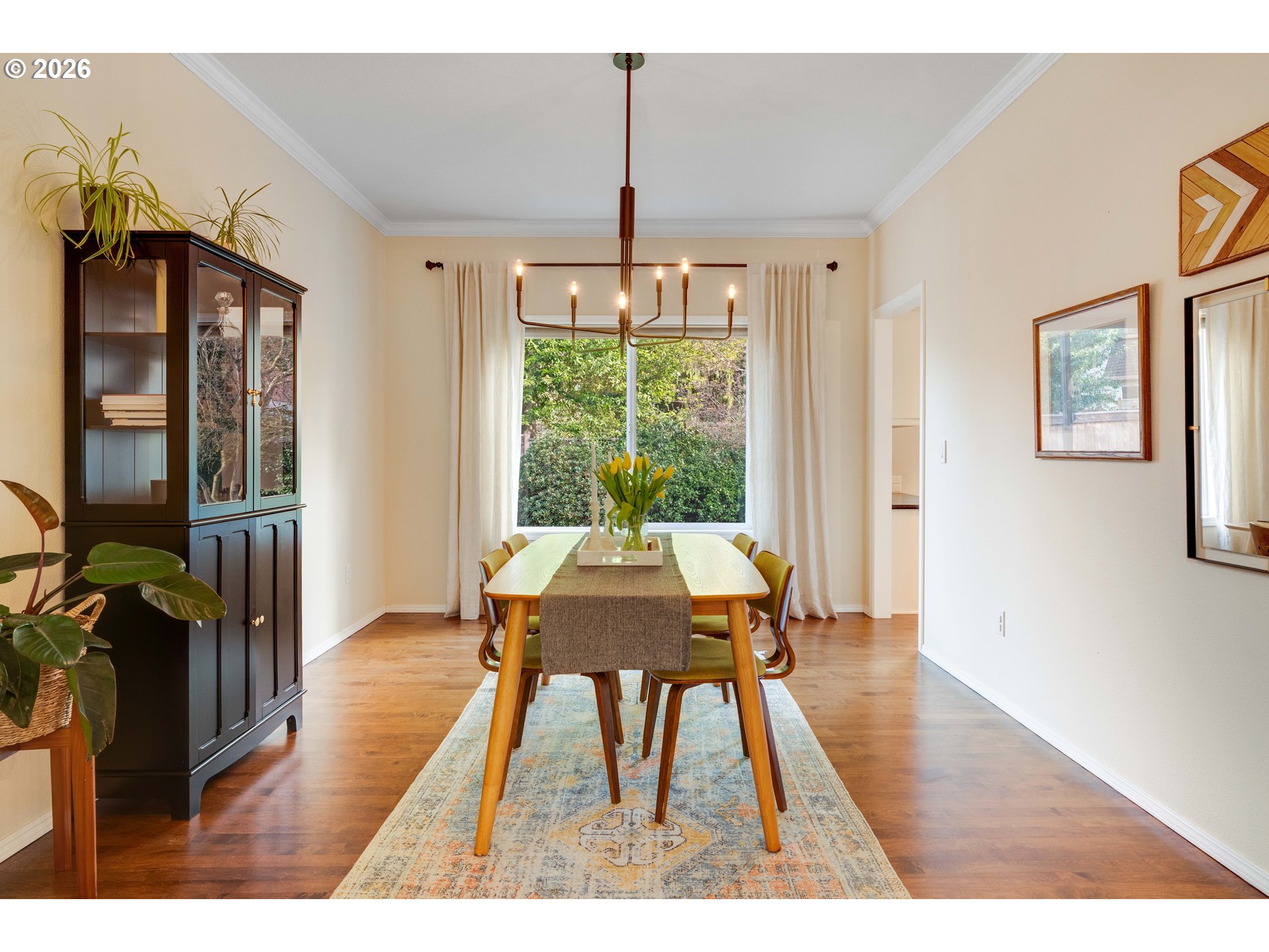 4485 Southwest Joshua Street Tualatin, OR 97062 - Photo 10 of 43 a view of a dining room with furniture window and wooden floor