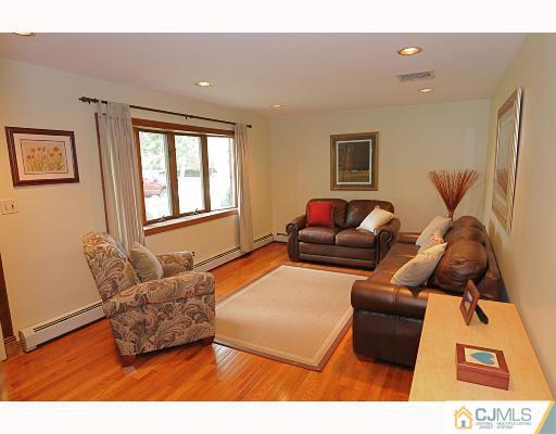 192 South Hill Road Colonia, NJ 07067 - Photo 2 of 7 a living room with furniture and a window