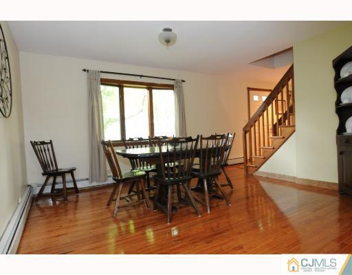 192 South Hill Road Colonia, NJ 07067 - Photo 5 of 7 a view of a dining room with furniture and a window