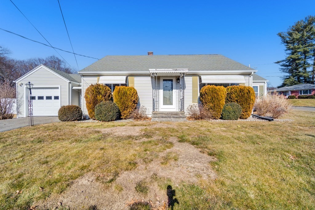 137 Lawrence Road Chicopee, MA 01013 - Photo 1 of 38 a front view of a house with a outdoor space