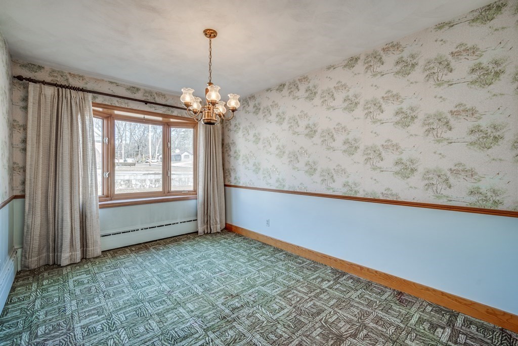137 Lawrence Road Chicopee, MA 01013 - Photo 20 of 38 a view of an empty room with a window