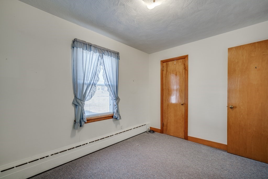 137 Lawrence Road Chicopee, MA 01013 - Photo 24 of 38 an empty room with windows