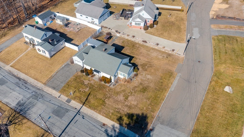 137 Lawrence Road Chicopee, MA 01013 - Photo 4 of 38 an aerial view of a house with a large window