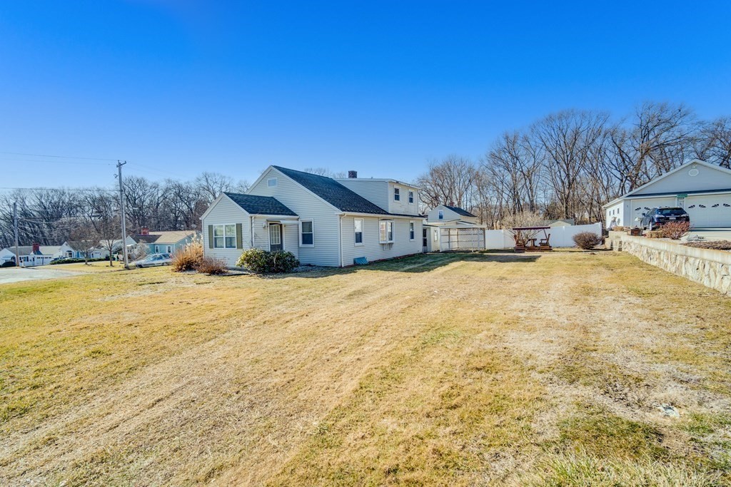 137 Lawrence Road Chicopee, MA 01013 - Photo 9 of 38 a view of a house with a yard