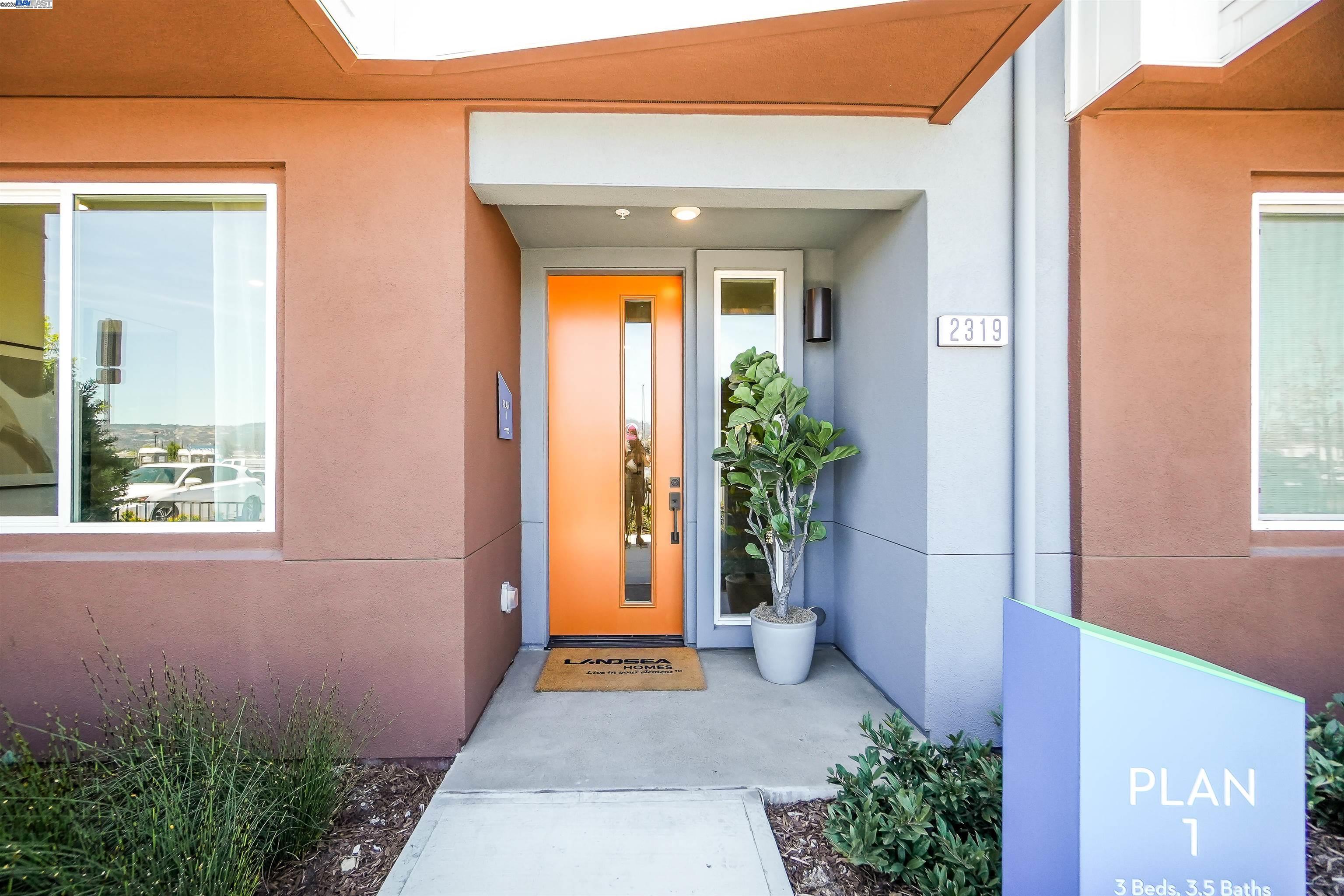 2256 Stanford Street Alameda, CA 94501 - Photo 3 of 60 a front view of a house with a yard