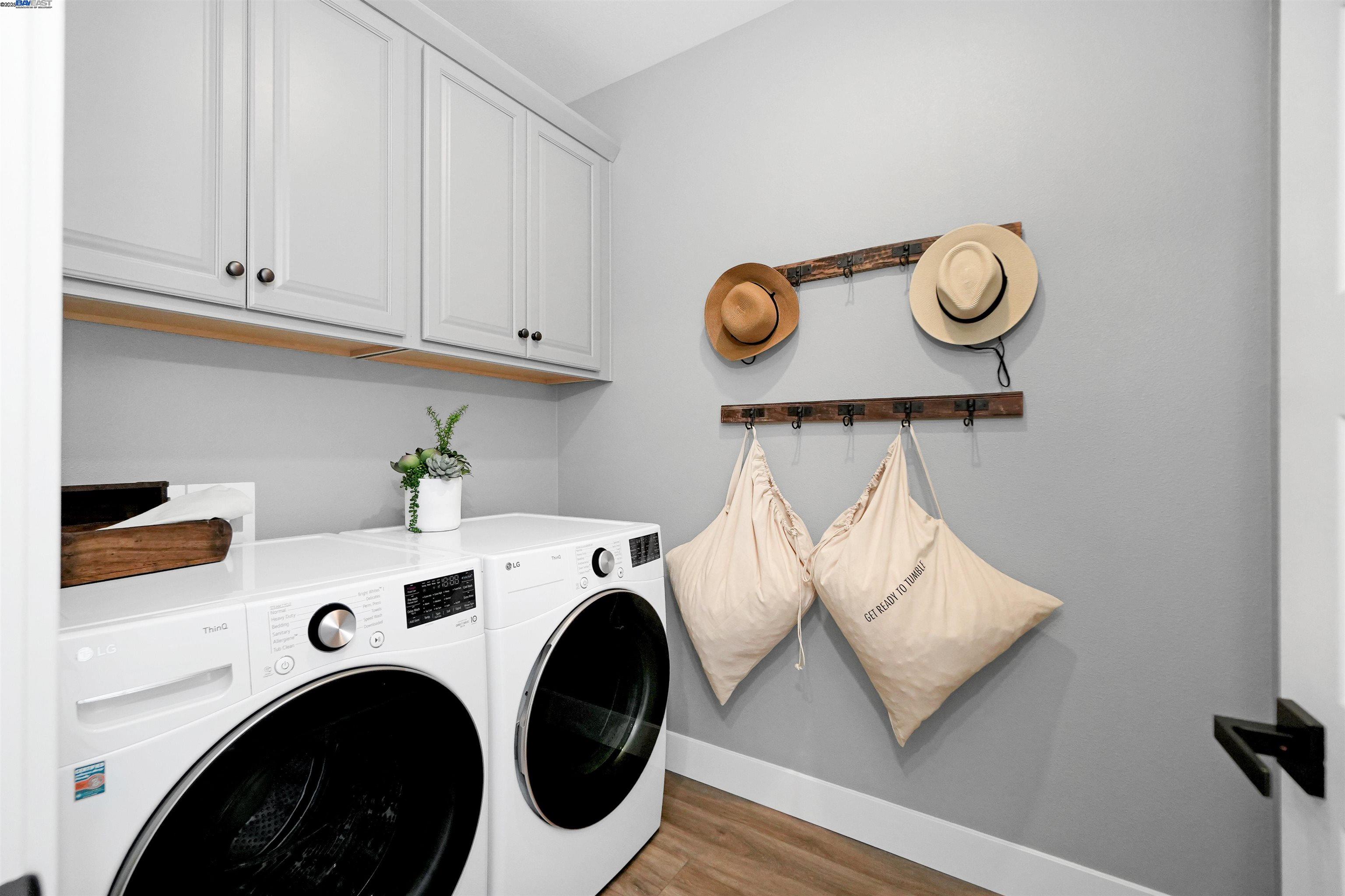 2256 Stanford Street Alameda, CA 94501 - Photo 31 of 60 a utility room with dryer and washer