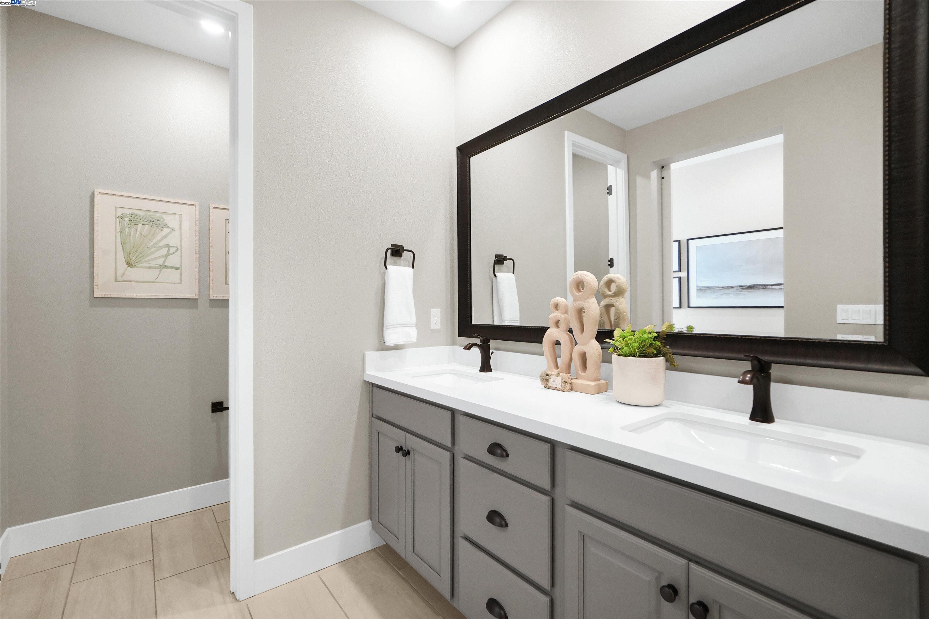 2256 Stanford Street Alameda, CA 94501 - Photo 39 of 60 a bathroom with a sink and a mirror