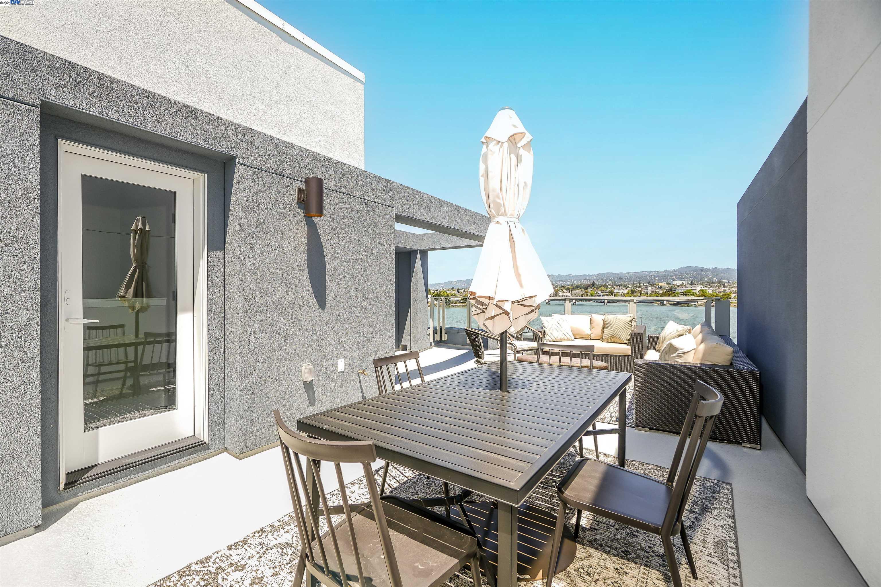 2256 Stanford Street Alameda, CA 94501 - Photo 43 of 60 a outdoor dining space with furniture and outdoor view