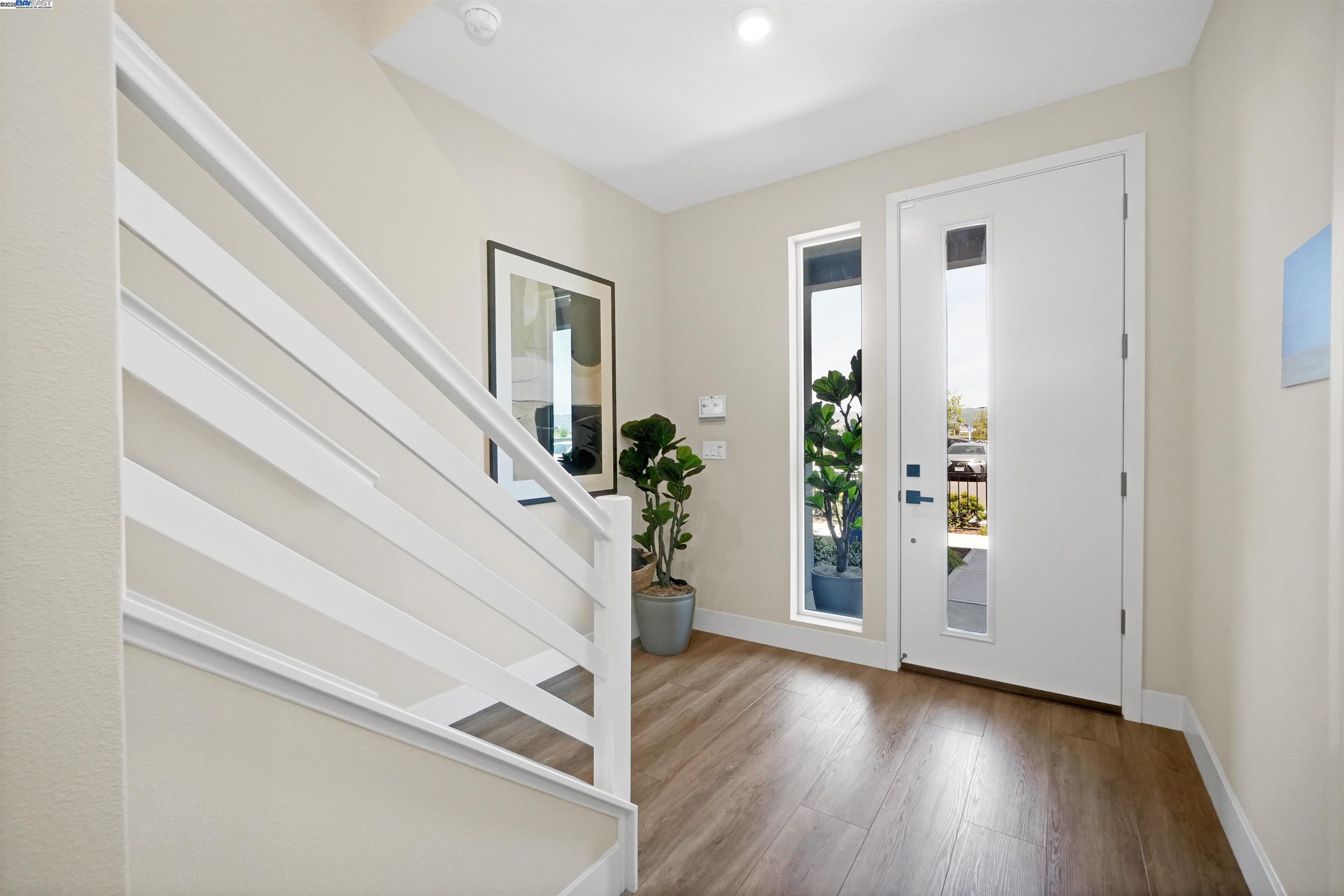 2256 Stanford Street Alameda, CA 94501 - Photo 6 of 60 a view of entryway with wooden floor