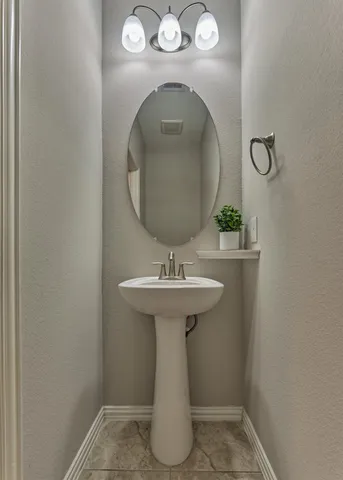 a kitchen with lots of counter top space sink and cabinets