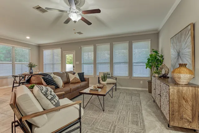 a bathroom with a double vanity sink mirror and shower