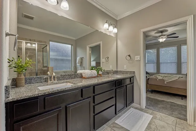 a view of a livingroom with a ceiling fan and window