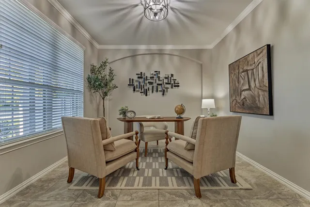a view of a dining room with furniture window and outside view