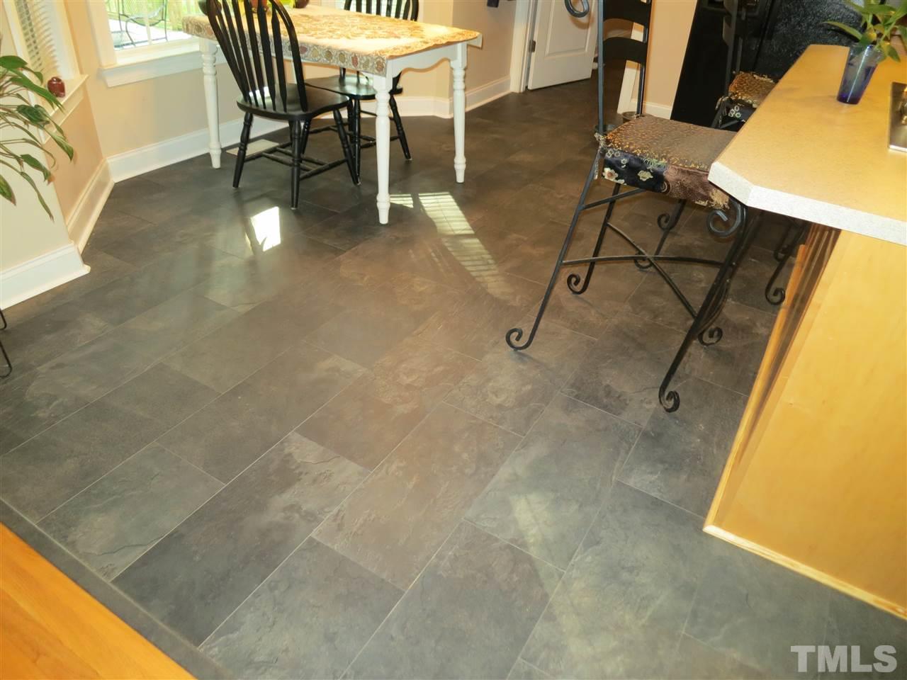 1328 Taylor Farm Road Raleigh, NC 27603 - Photo 22 of 24 a view of a room with furniture and wooden floor