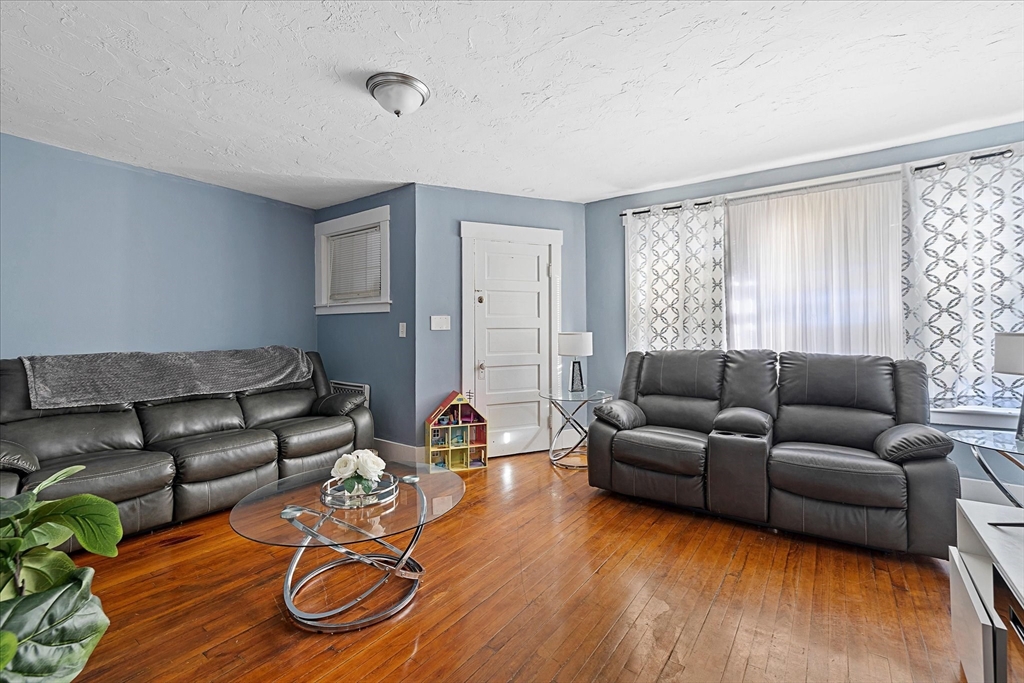 40 Sturbridge Road Charlton, MA 01507 - Photo 14 of 21 a living room with furniture and a wooden floor